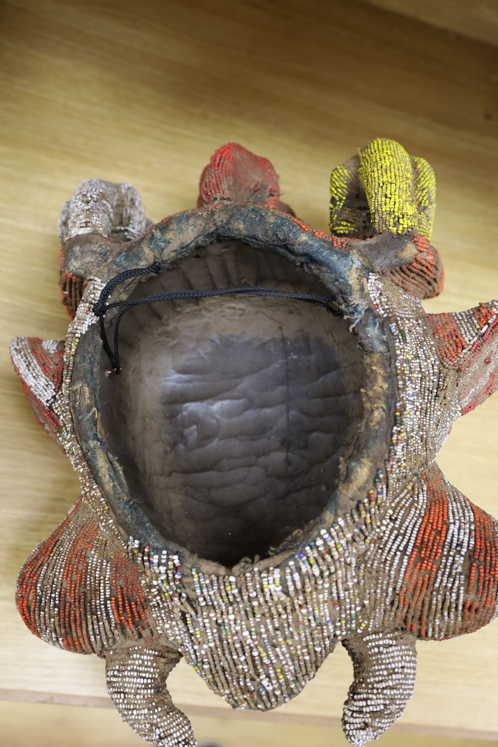 A large Bamileke tusked beadwork mask, Cameroon